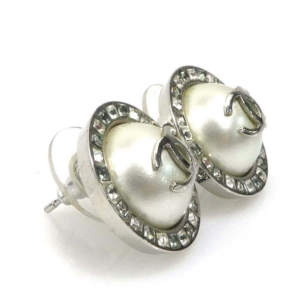 CHANEL Authentic White Pearl Logo Earrings - Picture 2 of 5
